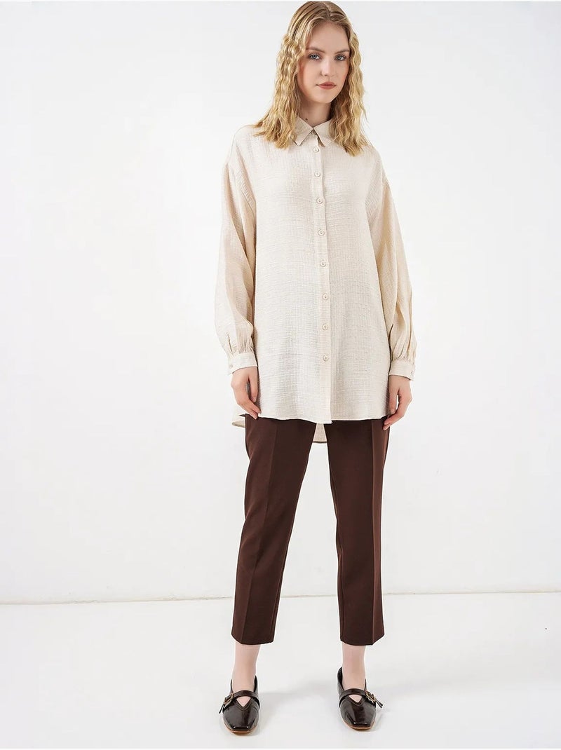 Blusa larga oversize texturizada con cuello de camisa bdart Crema - Kiabi