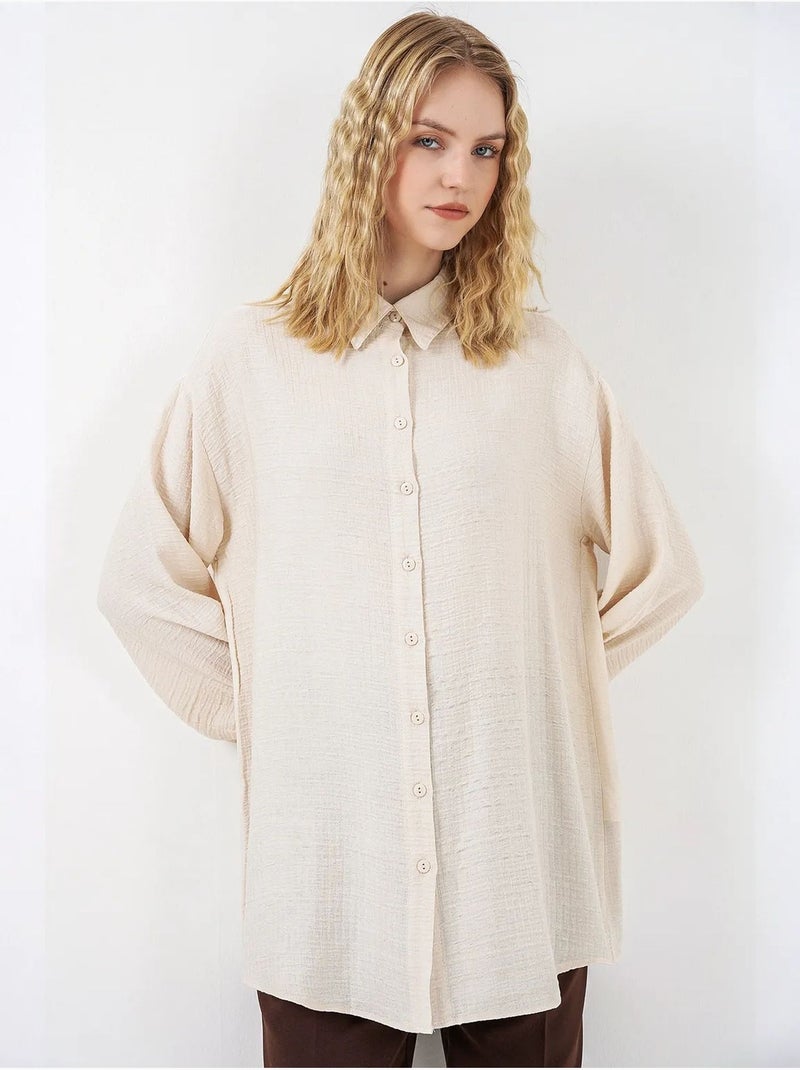 Blusa larga oversize texturizada con cuello de camisa bdart Crema - Kiabi