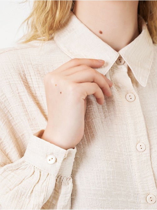 Blusa larga oversize texturizada con cuello de camisa bdart - Kiabi Blusa larga oversize texturizada con cuello de camisa bdart - Kiabi
