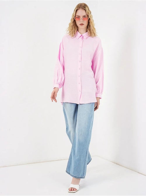Blusa larga oversize texturizada con cuello de camisa bdart - Kiabi Blusa larga oversize texturizada con cuello de camisa bdart - Kiabi