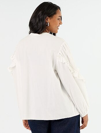 Blusa lisa con volantes