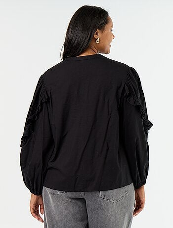 Blusa lisa con volantes