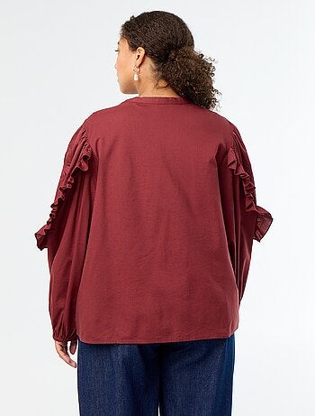 Blusa lisa con volantes