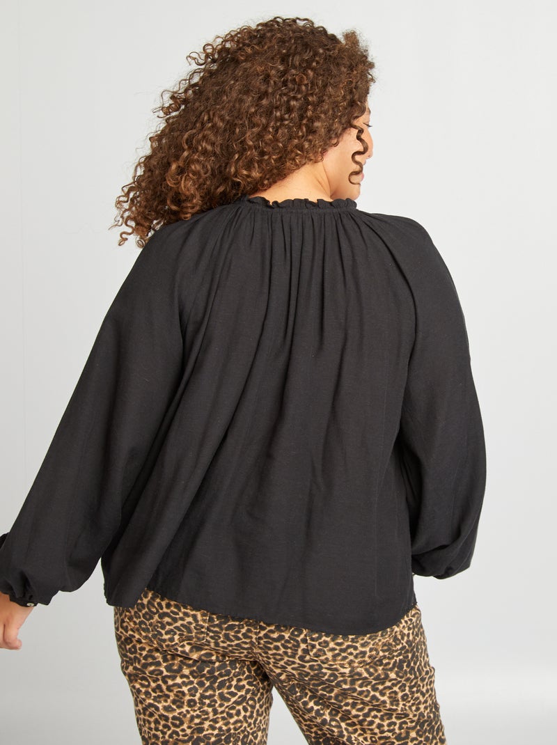 Blusa lisa con volantes y calados negro - Kiabi