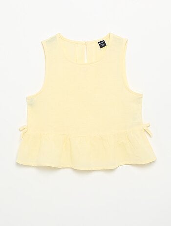 Blusa peplum con lazos fantasía