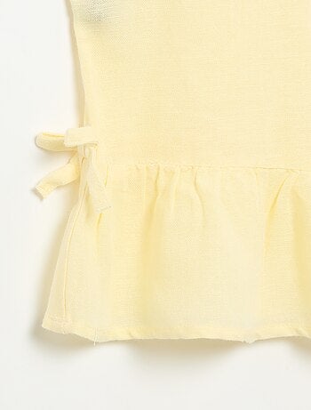 Blusa peplum con lazos fantasía