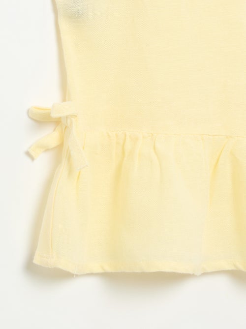 Blusa peplum con lazos fantasía - Kiabi