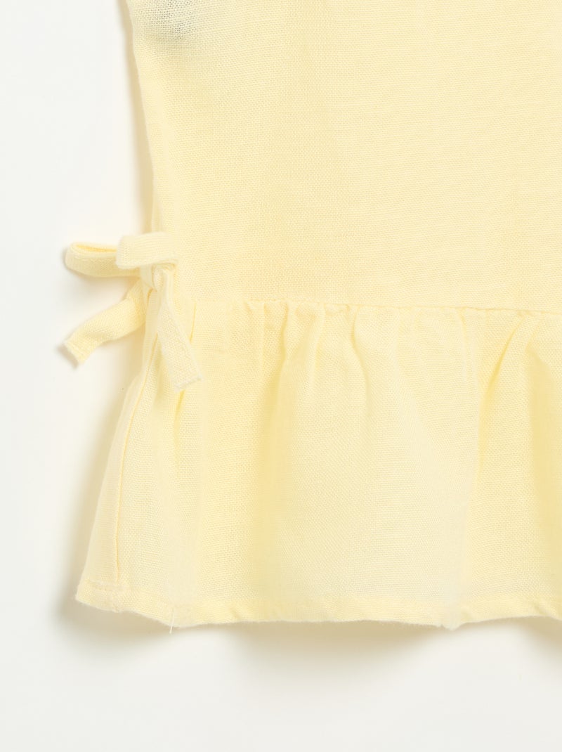 Blusa peplum con lazos fantasía Amarillo - Kiabi