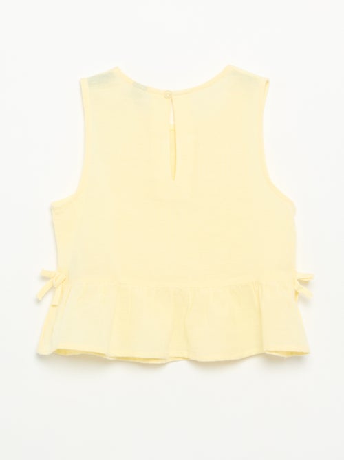 Blusa peplum con lazos fantasía - Kiabi
