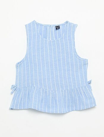 Blusa peplum con lazos fantasía