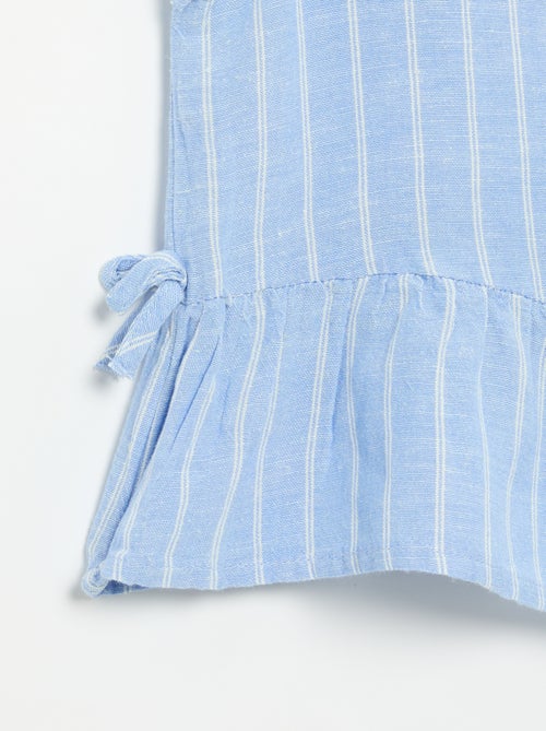 Blusa peplum con lazos fantasía - Kiabi