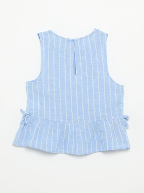 Blusa peplum con lazos fantasía - Kiabi