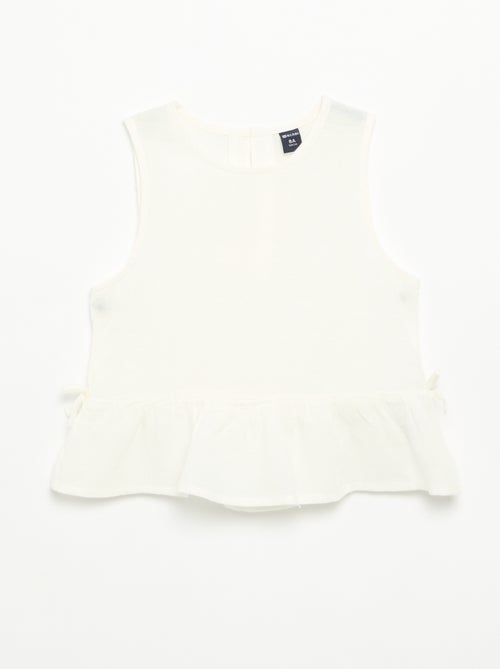 Blusa peplum con lazos fantasía - Kiabi