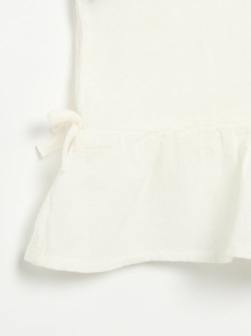 Blusa peplum con lazos fantasía - Kiabi