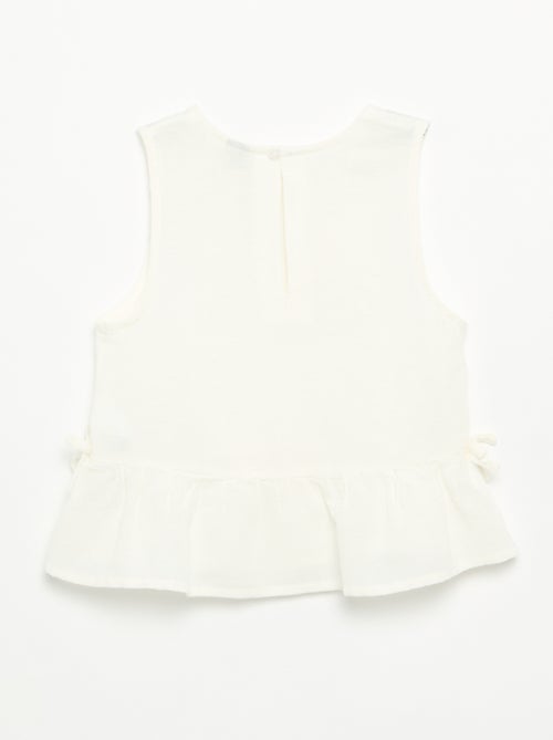 Blusa peplum con lazos fantasía - Kiabi