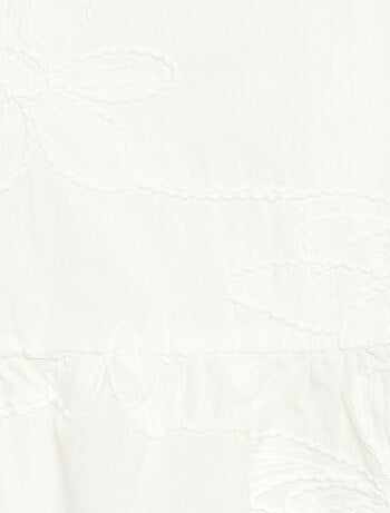 Blusa sin mangas con bordados florales