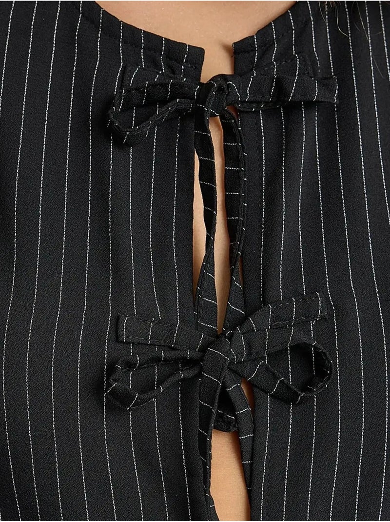 Blusa sin mangas con cuello redondo a rayas Negro - Kiabi