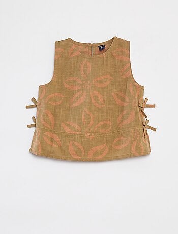 Blusa sin mangas con lazos