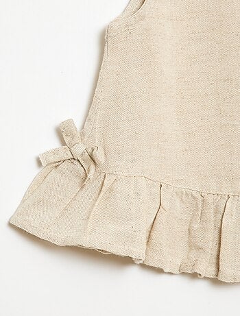 Blusa sin mangas con volantes y lazos