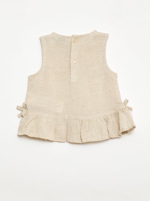 Blusa sin mangas con volantes y lazos - Kiabi