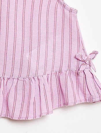 Blusa sin mangas con volantes y lazos