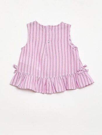 Blusa sin mangas con volantes y lazos