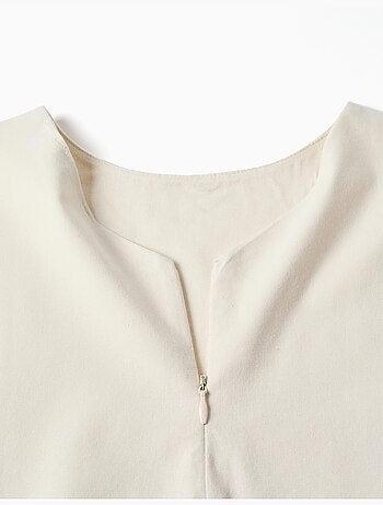 Blusa sin mangas de línea A con base festoneada