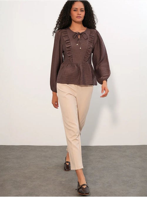 Blusa tejida con volantes y cierre de lazada bdart - Kiabi Blusa tejida con volantes y cierre de lazada bdart - Kiabi