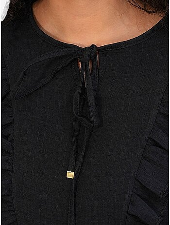 Blusa tejida con volantes y cierre de lazada bdart