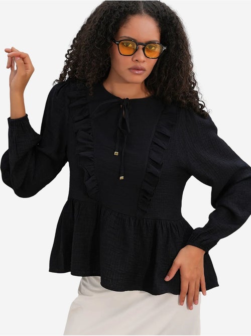 Blusa tejida con volantes y cierre de lazada bdart - Kiabi Blusa tejida con volantes y cierre de lazada bdart - Kiabi