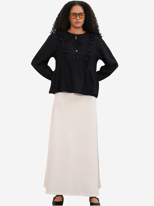 Blusa tejida con volantes y cierre de lazada bdart - Kiabi Blusa tejida con volantes y cierre de lazada bdart - Kiabi