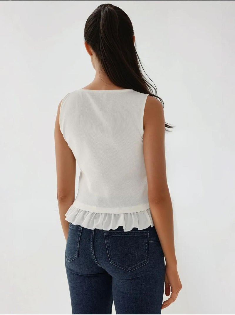 Blusa texturizada de cuello redondo con detalle de volante Blanco - Kiabi