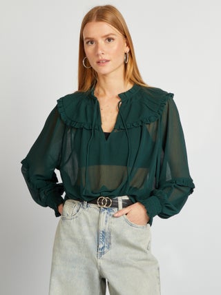 Blusa transparente con gorguera