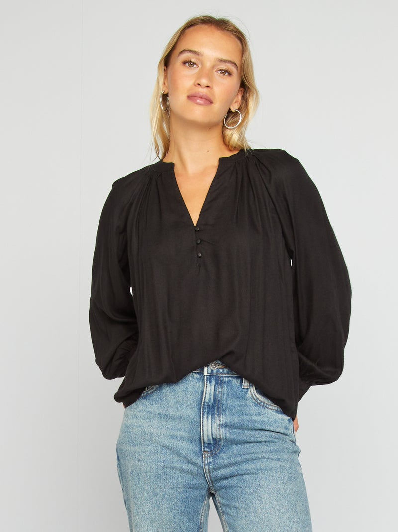 Blusa vaporosa con estampado negro - Kiabi