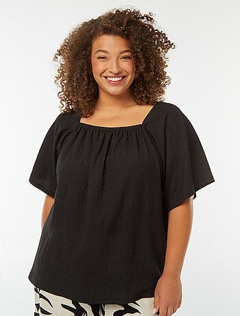 Blusa vaporosa de punto gofrado con cuello bardot