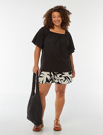 Blusa vaporosa de punto gofrado con cuello bardot