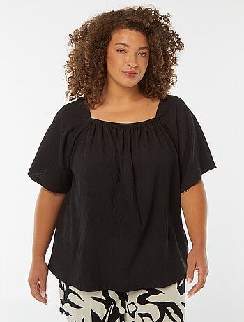 Blusa vaporosa de punto gofrado con cuello bardot