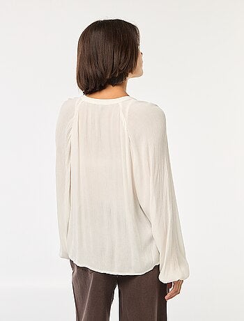 Blusa vaporosa lisa