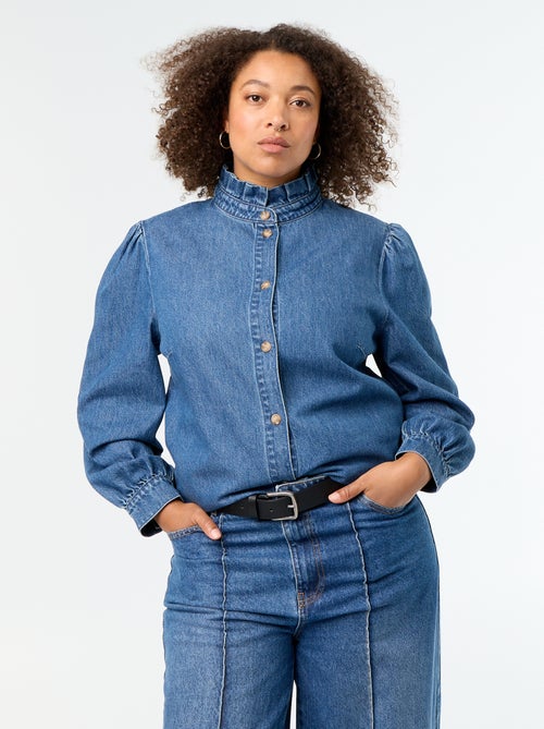 Blusa vaquera con cuello alto con volantes - Kiabi Blusa vaquera con cuello alto con volantes - Kiabi