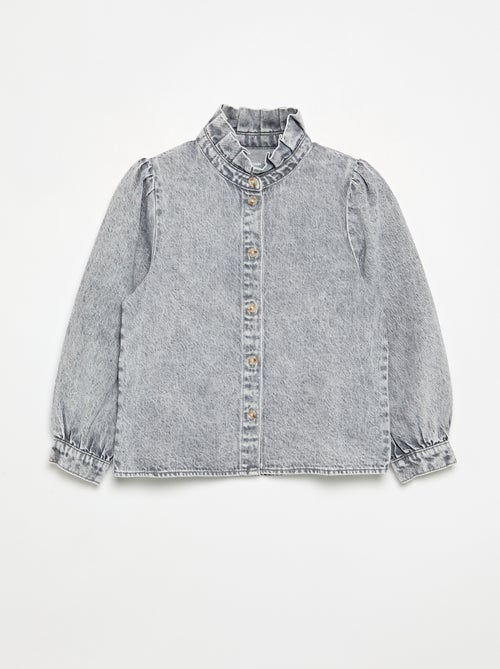 Blusa vaquera con cuello alto con volantes - Kiabi Blusa vaquera con cuello alto con volantes - Kiabi