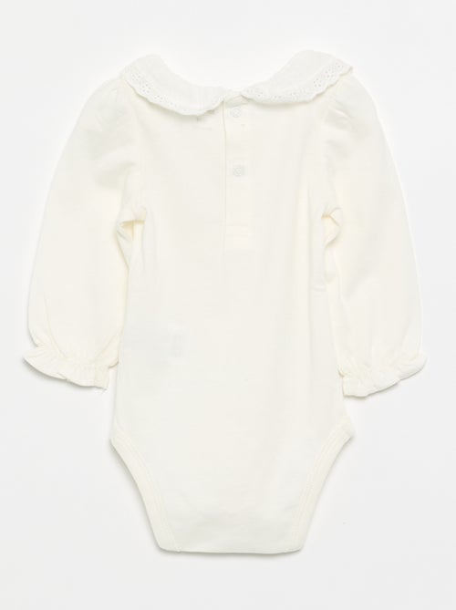 Body con cuello volante - Kiabi Body con cuello volante - Kiabi