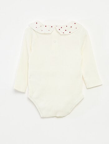 Body de canalé con cuello volante