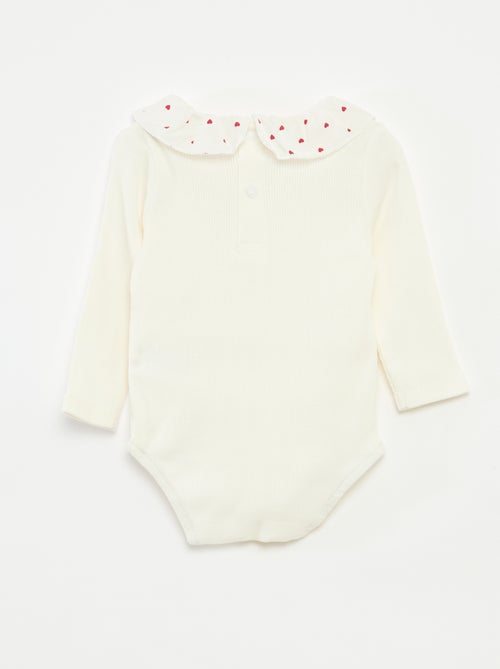 Body de canalé con cuello volante - Kiabi