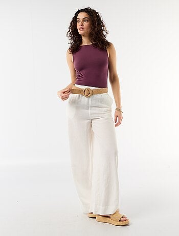 Body de espalda escotada con joya dorada