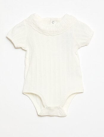 Body de manga larga en punto de canalé con cuello fantasía