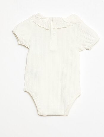 Body de manga larga en punto de canalé con cuello fantasía
