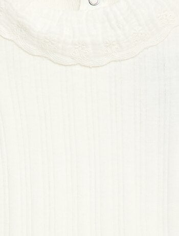 Body de manga larga en punto de canalé con cuello fantasía