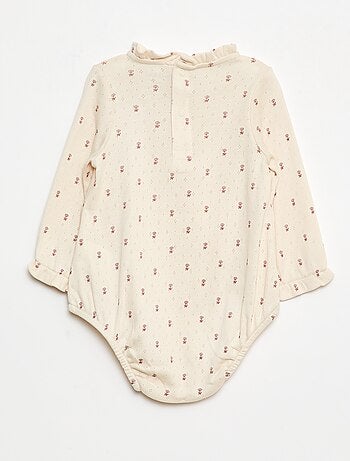 Body de punto calado con cuello volante y estampado integral