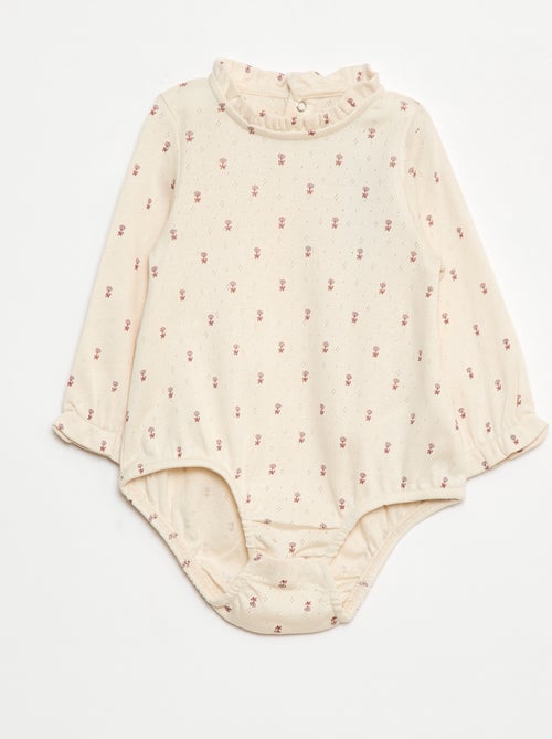 Body de punto plumeti con cuello volante y estampado integral - Kiabi