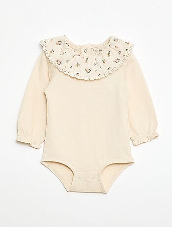 Body liso con cuello Claudine estampado